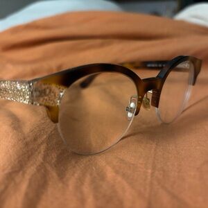 Jimmy Choo toirtoise frame with glitter accent by Jimmy Choo!
